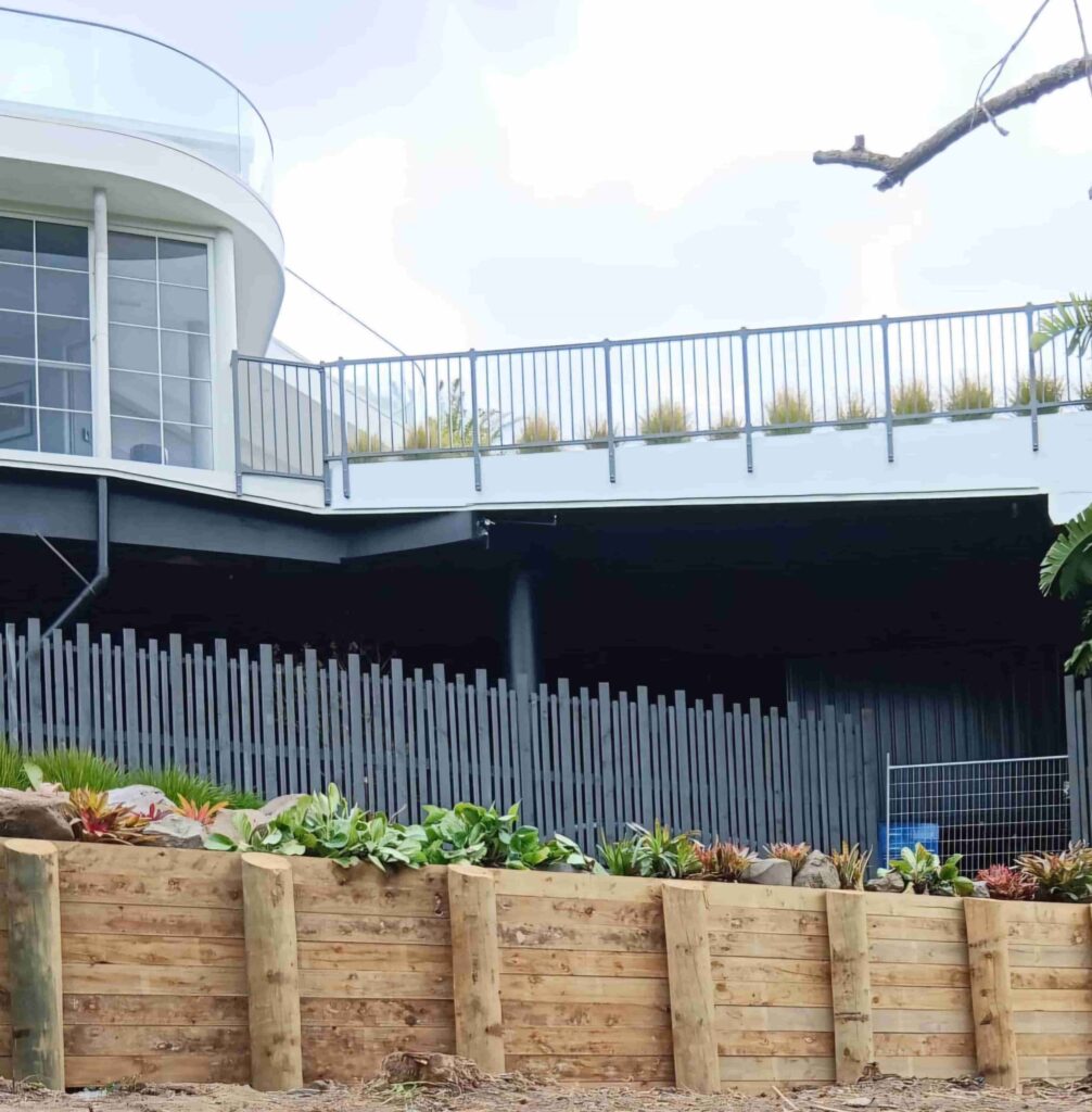 Timber retaining wall and planting